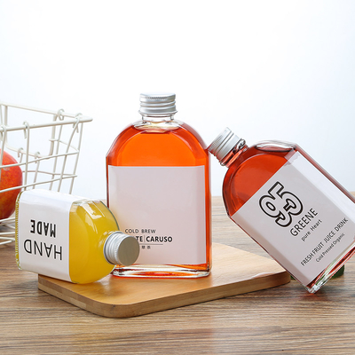 ISO9001 Glass Flat Water Wine Bottle Clear 100ml 200ml Whiskey Container