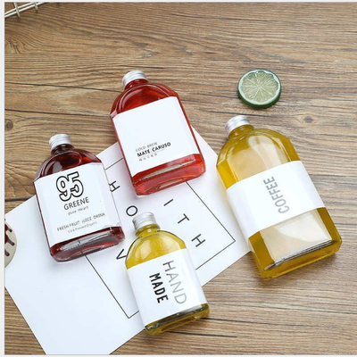 ISO9001 Glass Flat Water Wine Bottle Clear 100ml 200ml Whiskey Container